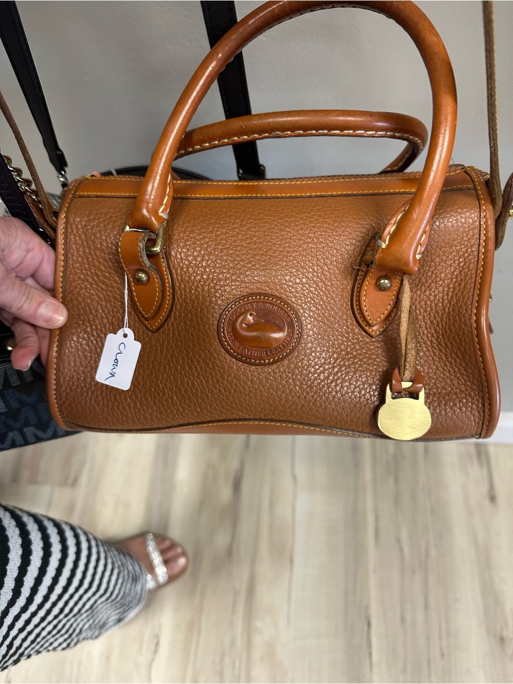 Dooney & Bourke Brown Pebbled Leather Satchel with Logo Medallion